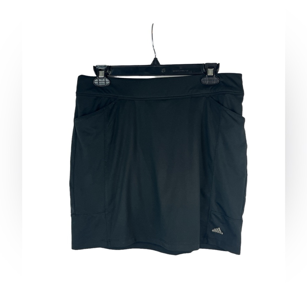 Adidas‎ woman’s black athletic skort size small.